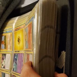 Full binder of pokemon cards a few expensive cards and a few ex cards are with i